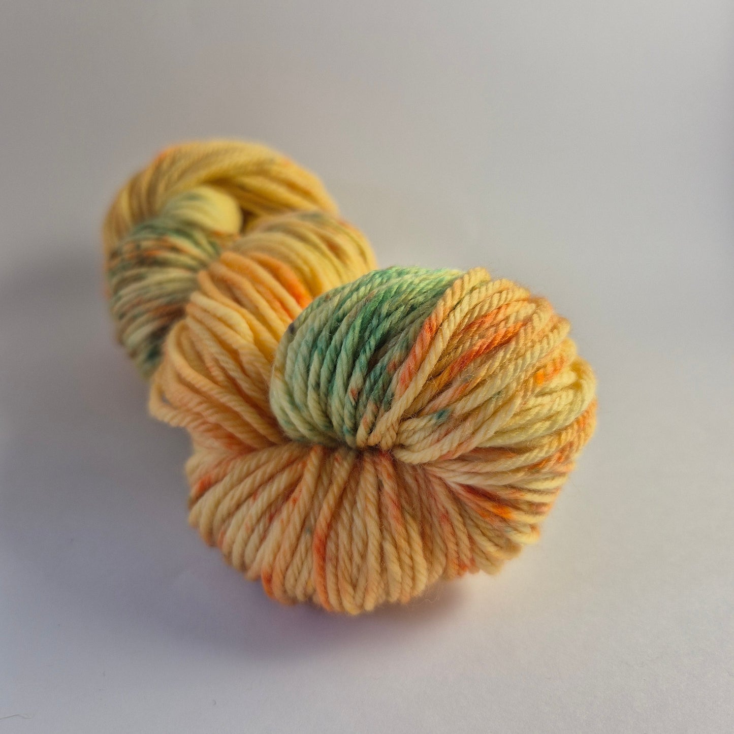 Sun Conure – Hand Dyed 100% Merino Yarn (8ply DK, 100g Skein)